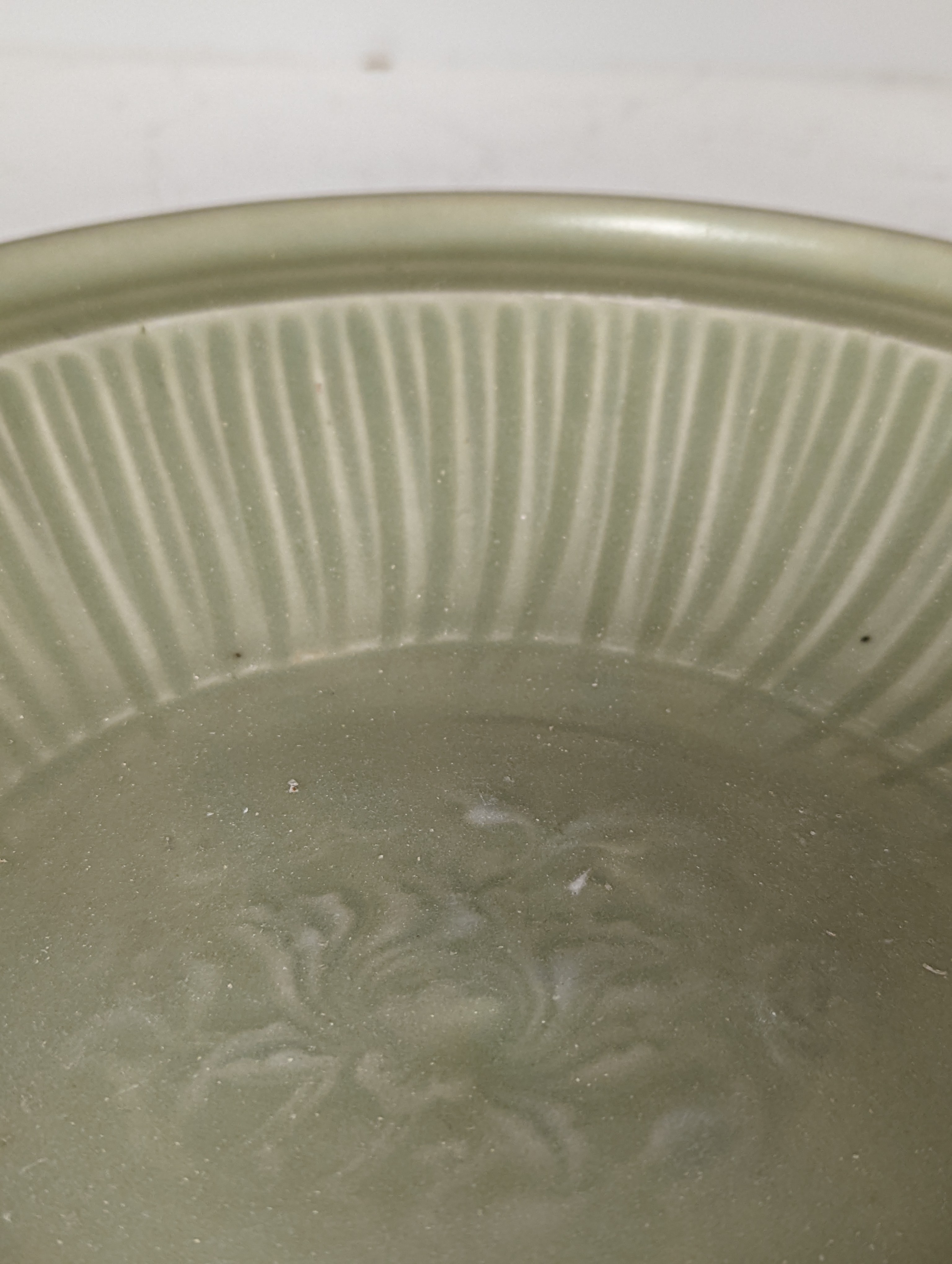 A Chinese Longquan celadon dish, 14th/15th century - 29cm wide